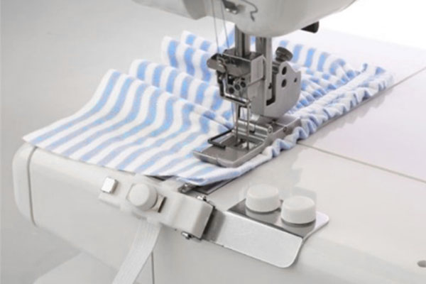 Pose d'une élastique à la recouvreuse